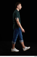  Trent  1 blue jeans casual dressed green t shirt side view walking white sneakers whole body 0004.jpg